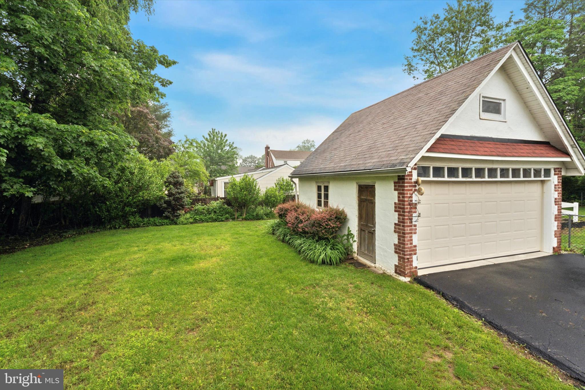 1442 Dorchester Road Havertown, PA 19083 - Photo 44 of 45 a front view of a house with garden