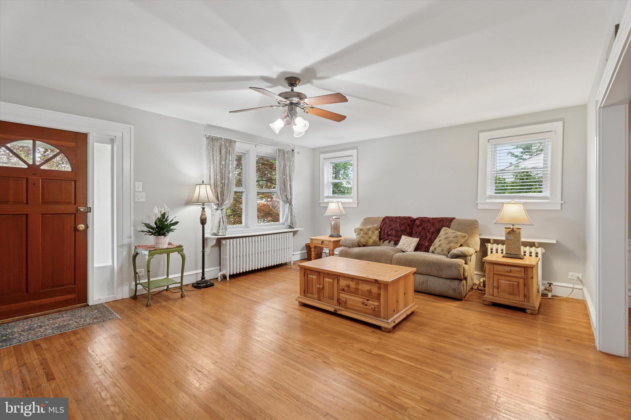 1442 Dorchester Road Havertown, PA 19083 - Photo 6 of 45 a living room with furniture and a flat screen tv