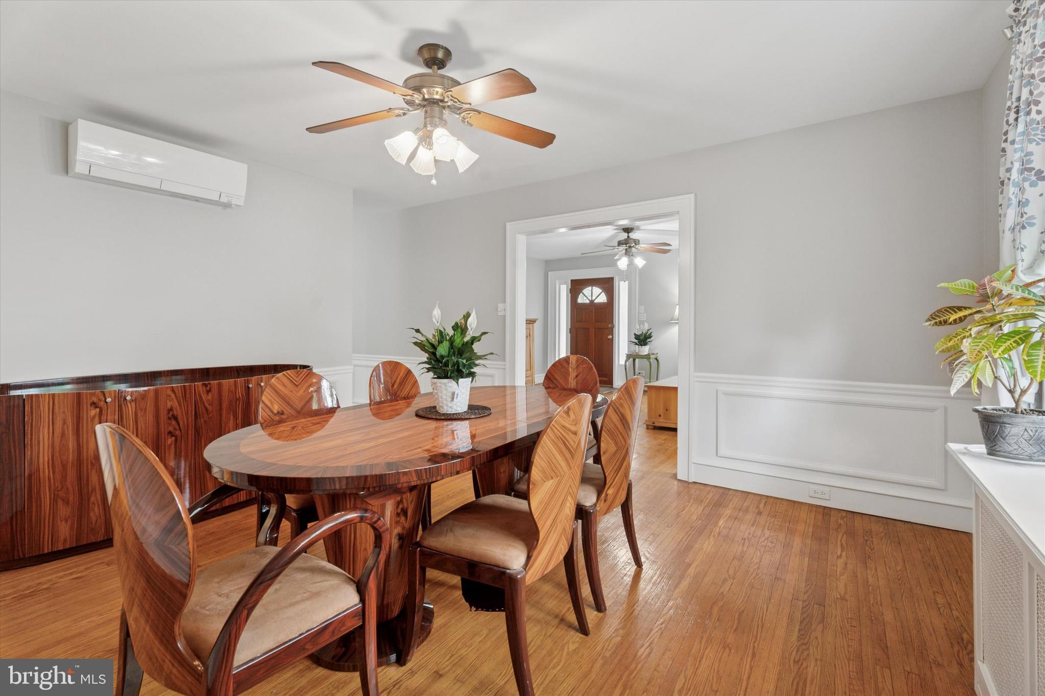 1442 Dorchester Road Havertown, PA 19083 - Photo 9 of 45 a view of a dining room with furniture and wooden floor