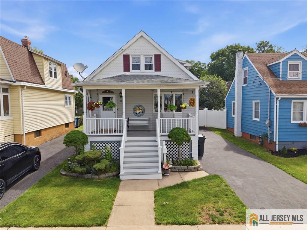 50 3rd Street Fords, NJ 08863 - Photo 2 of 36 a front view of a house with a yard
