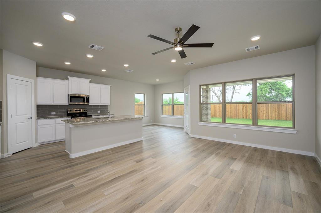 412 Heritage Grove Road Blue Ridge, TX 75424 - Photo 2 of 20 a view of kitchen with sink and wooden floor