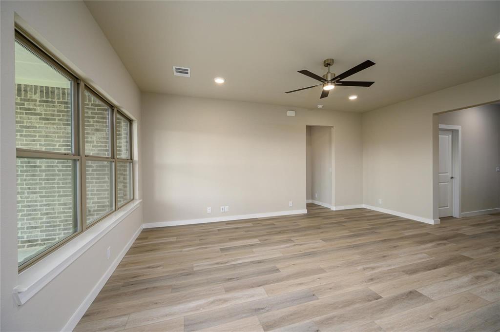 412 Heritage Grove Road Blue Ridge, TX 75424 - Photo 8 of 20 a view of an empty room with a window