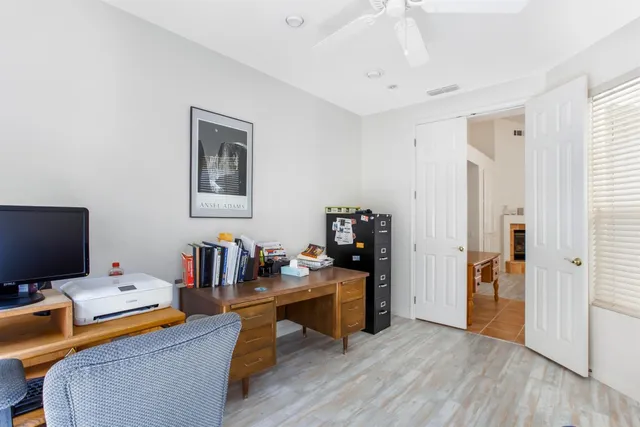 a room with furniture and a flat screen tv