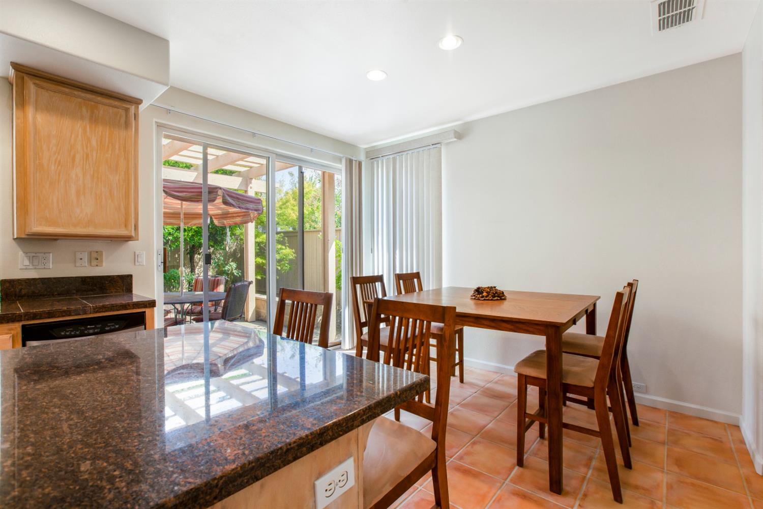 1160 Cobblefields Court Folsom, CA 95630 - Photo 9 of 26 a view of a dining room with furniture window and outside view