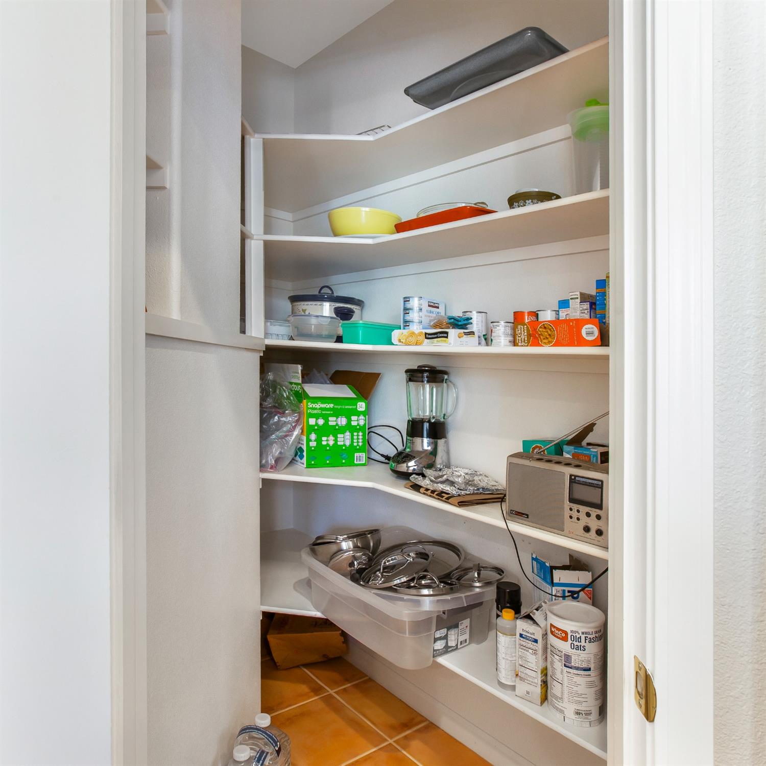 1160 Cobblefields Court Folsom, CA 95630 - Photo 10 of 26 a kitchen with a stove and a shelf with wooden floor