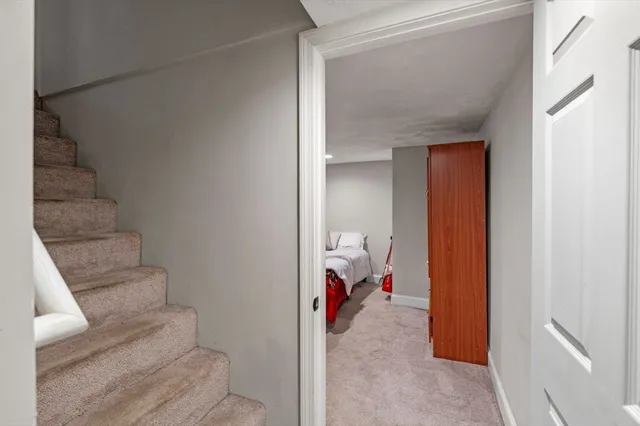 a bedroom with a bed and furniture