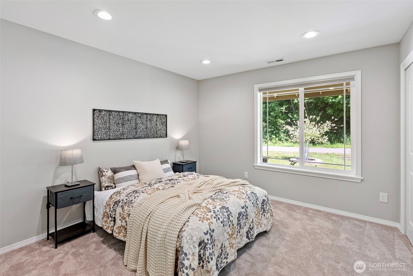 40 Northeast Eagle Crest Place Belfair, WA 98528 - Photo 16 of 27 a bedroom with a bed and a window