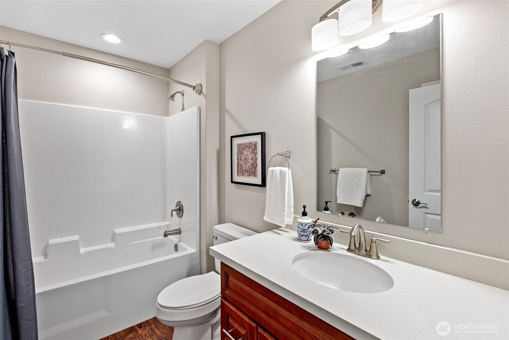 40 Northeast Eagle Crest Place Belfair, WA 98528 - Photo 18 of 27 a bathroom with a sink a toilet and shower