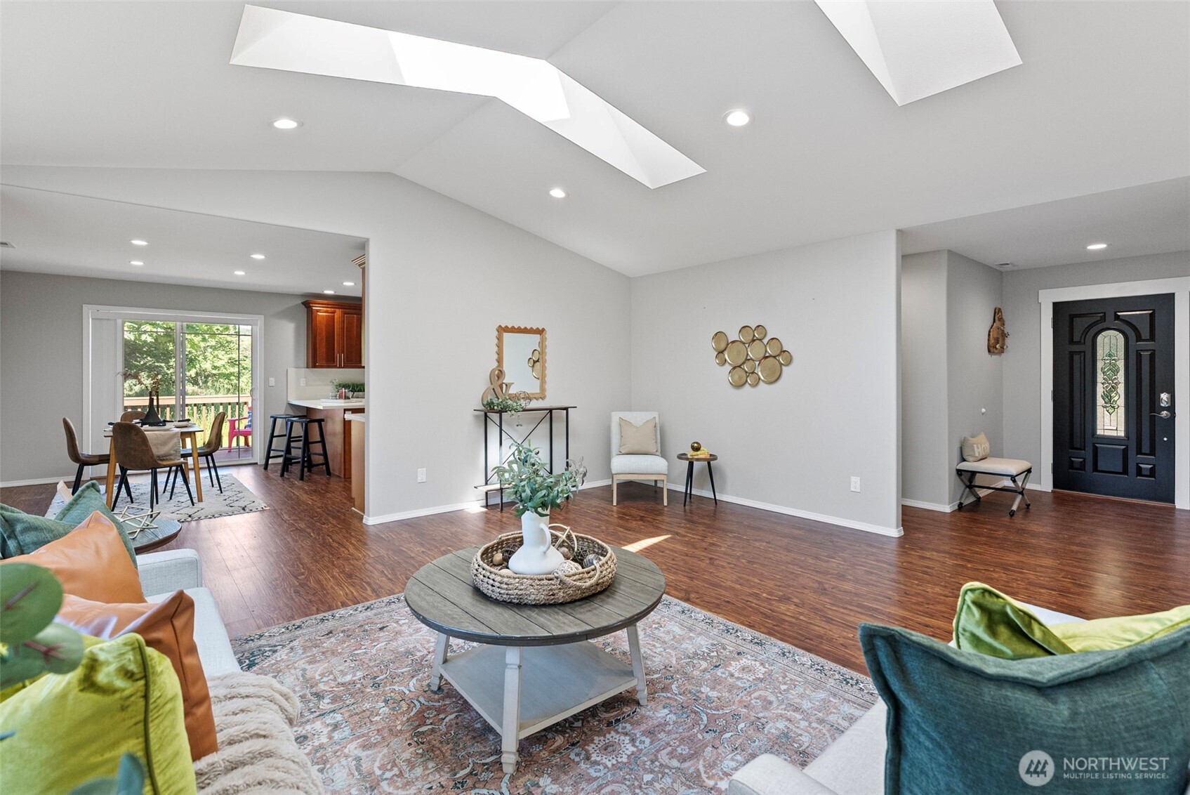 40 Northeast Eagle Crest Place Belfair, WA 98528 - Photo 4 of 27 a living room with furniture and a wooden floor