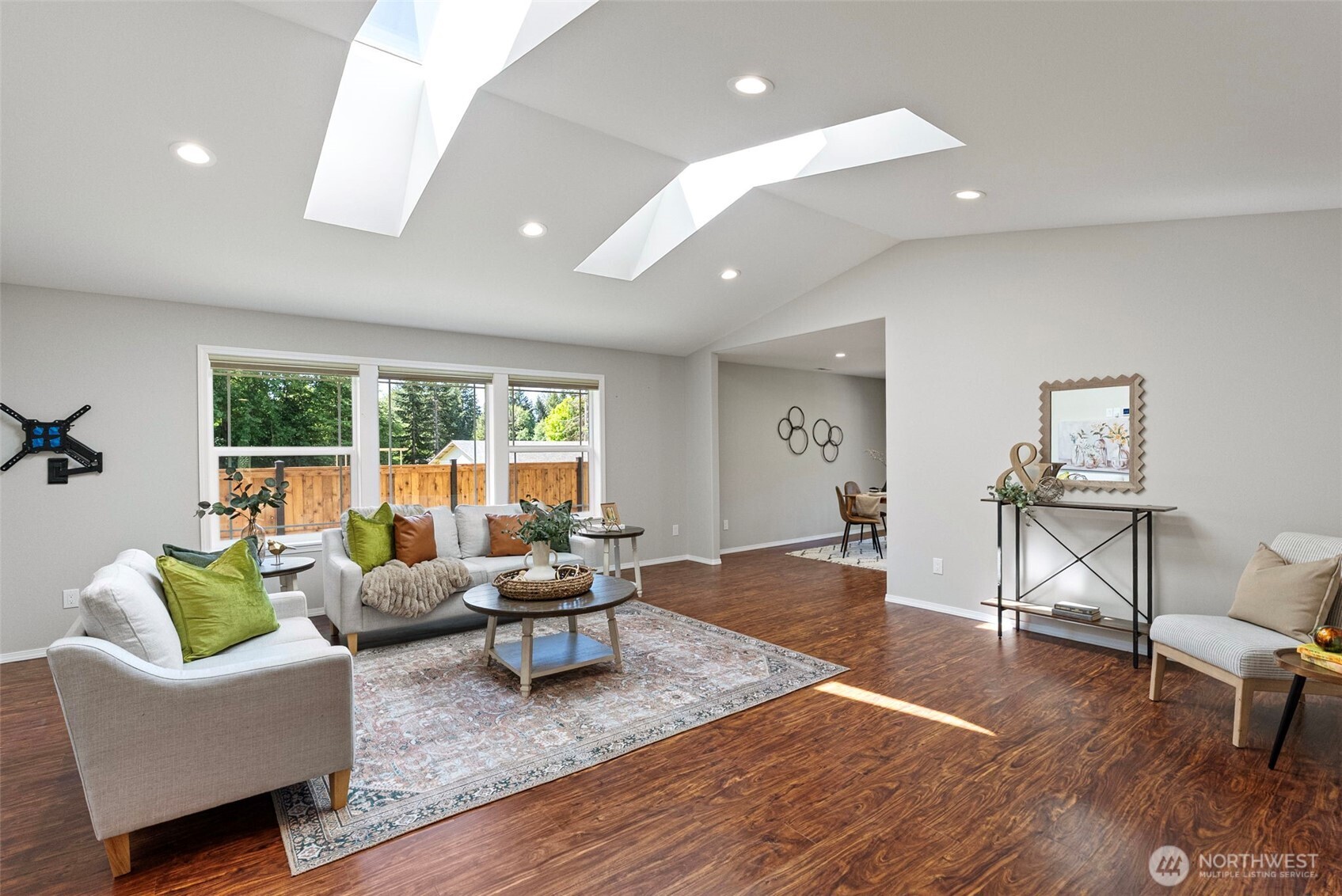 40 Northeast Eagle Crest Place Belfair, WA 98528 - Photo 5 of 27 a living room with furniture and a wooden floor