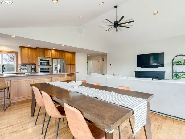 a dining room with furniture and window