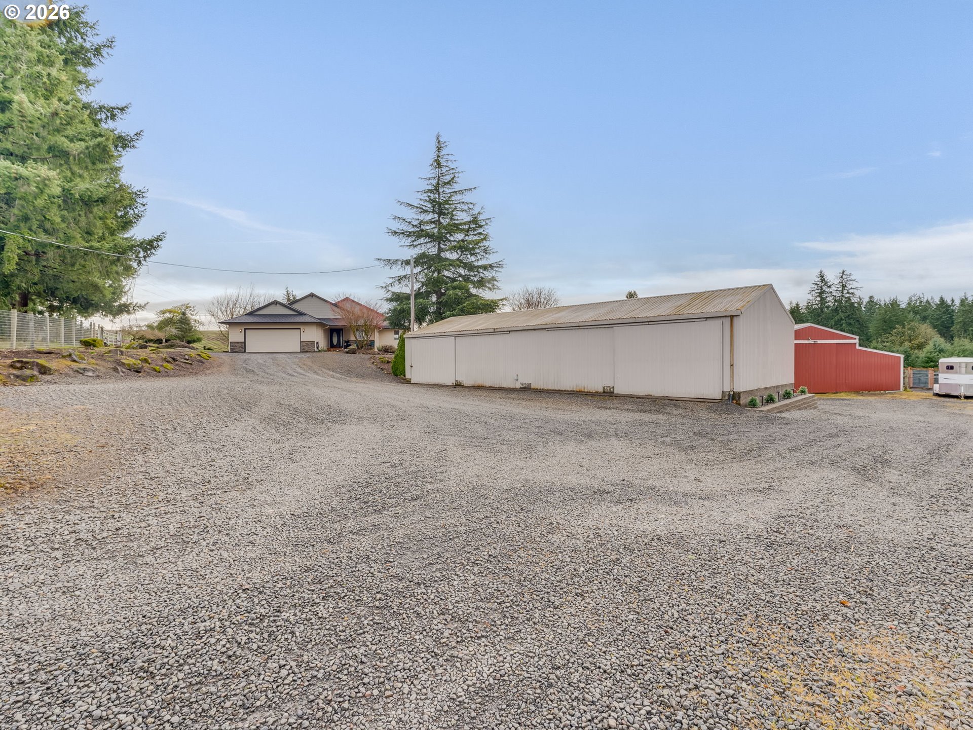 33100 Southeast Gunderson Road Boring, OR 97009 - Photo 21 of 48 a view of a dry yard with wooden fence