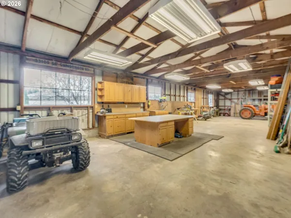 a view of a kitchen with kitchen countertops and a sink