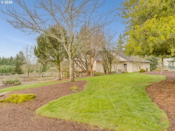 a view of a lake with a yard