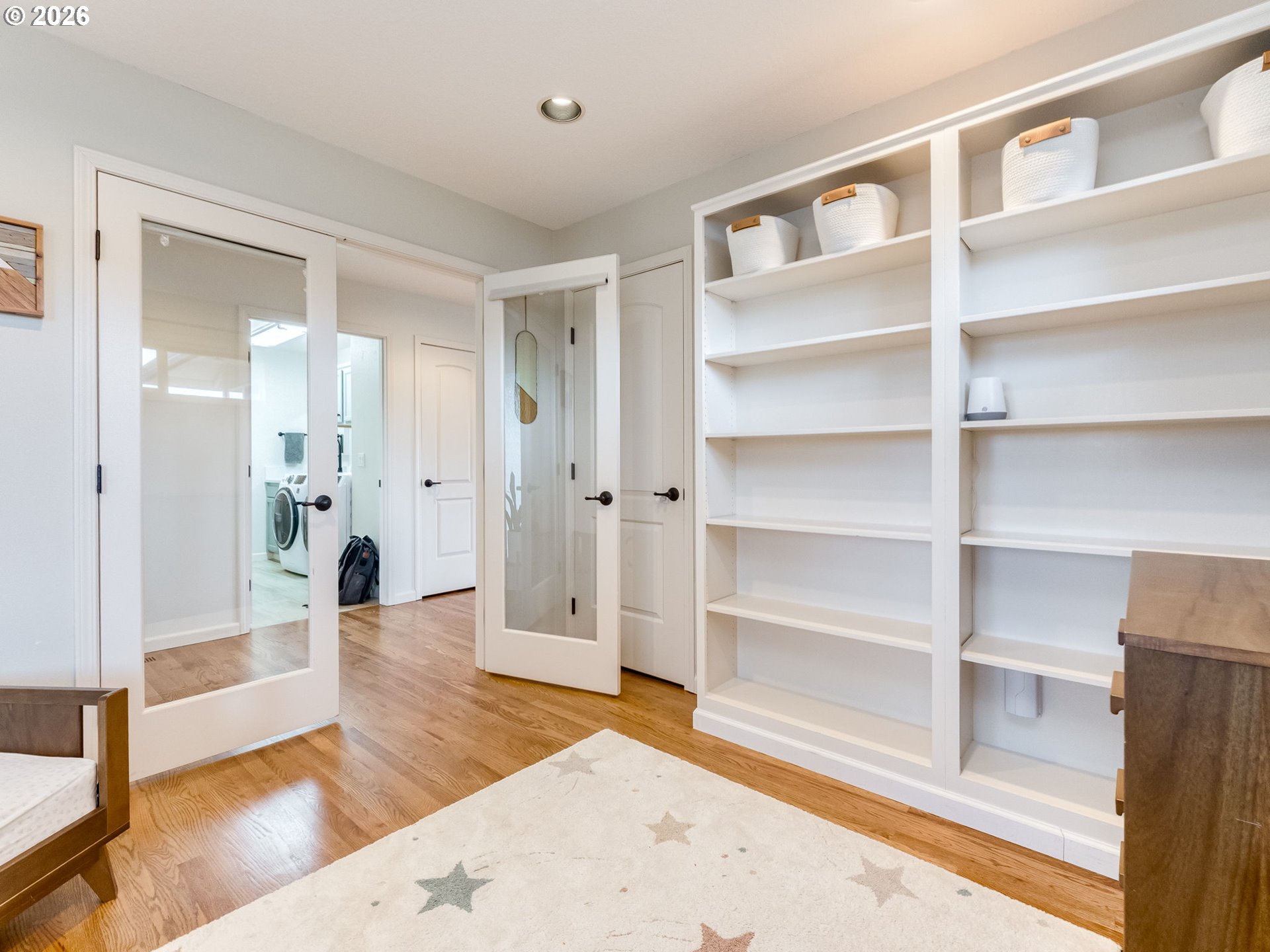 33100 Southeast Gunderson Road Boring, OR 97009 - Photo 43 of 48 a view of an empty room with wooden floor and a window