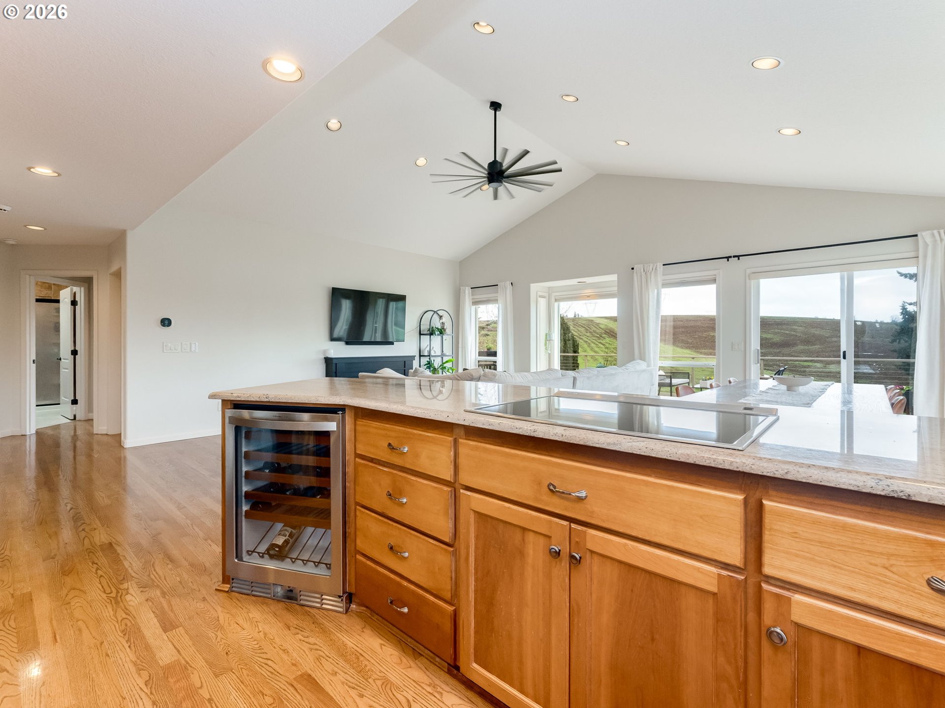 33100 Southeast Gunderson Road Boring, OR 97009 - Photo 7 of 48 a view of a kitchen with cabinets and wooden floor