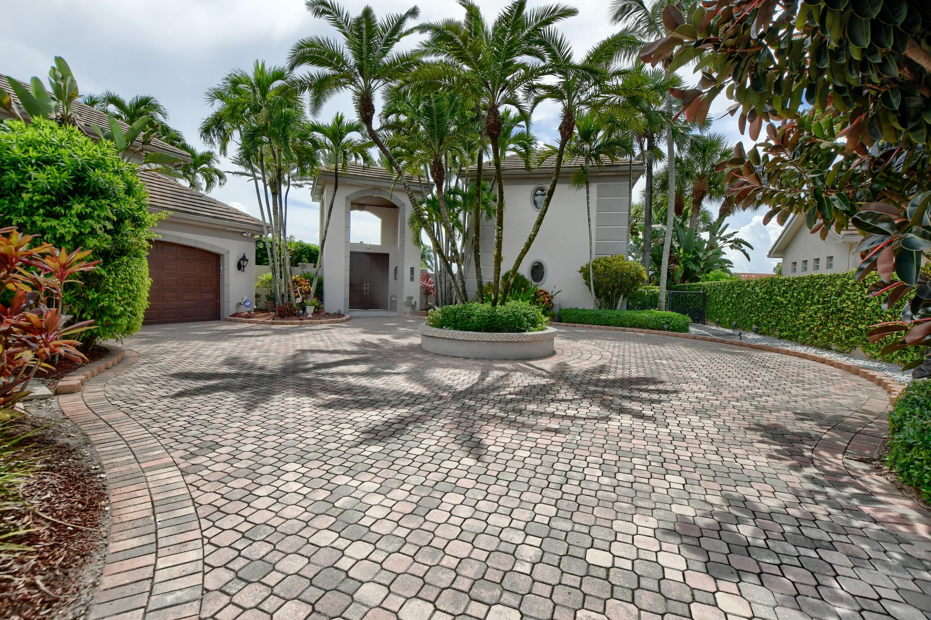 6187 Northwest 24th Terrace Boca Raton, FL 33496 - Photo 4 of 58 Driveway
