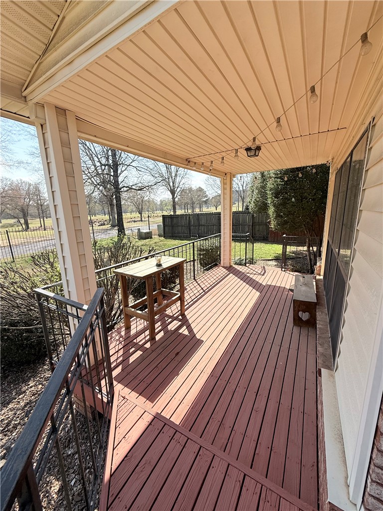 76 Club Road Dover, AR 72837 - Photo 34 of 36 Wooden deck with a fenced backyard