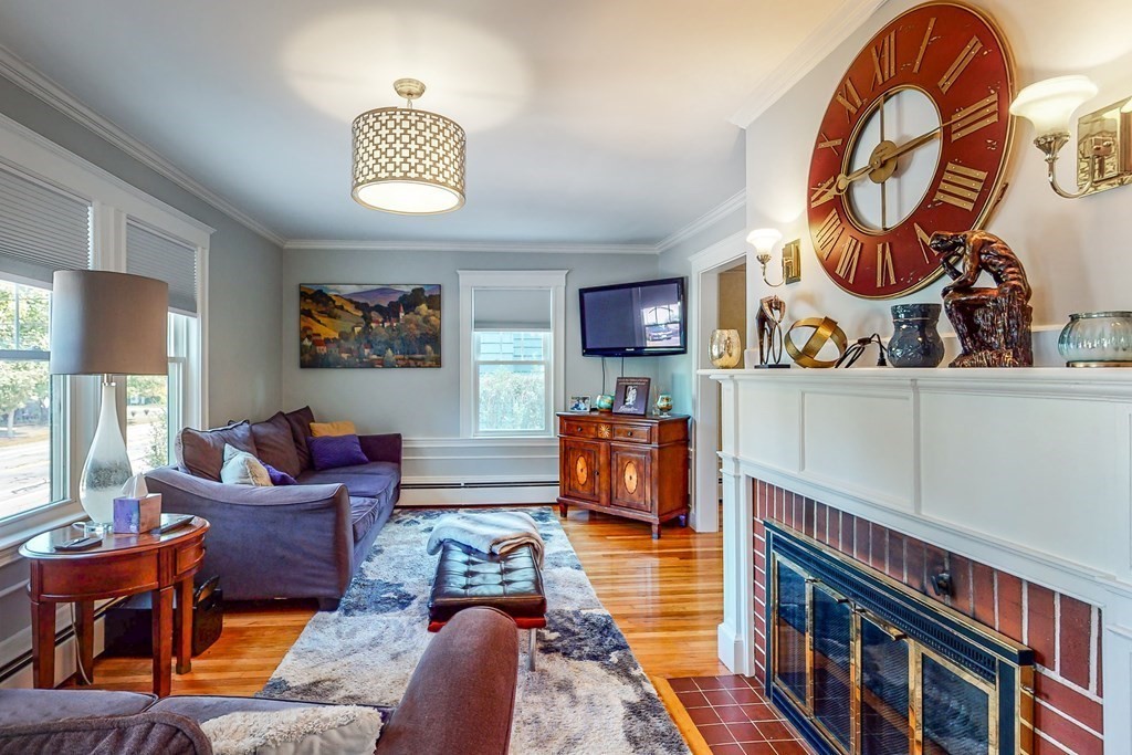 1073 Brook Road Milton, MA 02186 - Photo 8 of 30 a living room with furniture a rug and a window