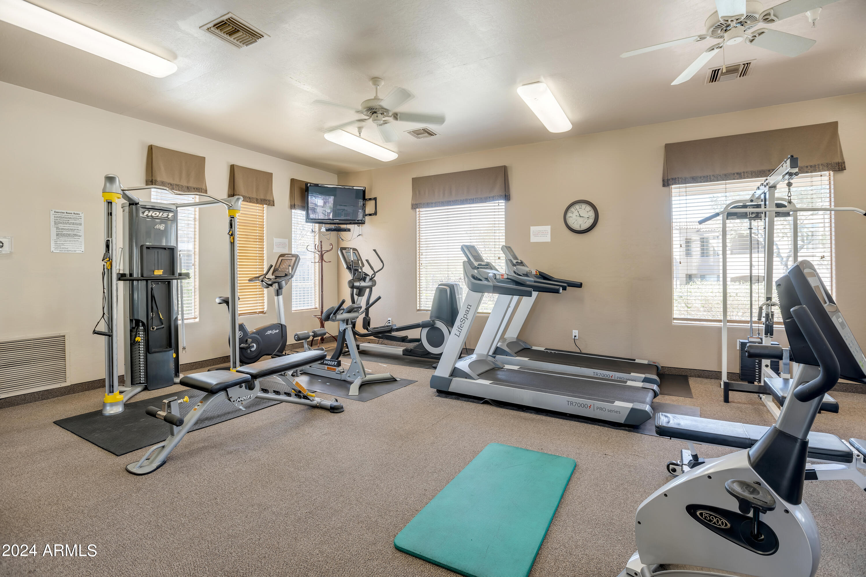 19550 North Grayhawk Drive, Unit 1137 Scottsdale, AZ 85255 - Photo 47 of 48 a view of a room with gym equipment