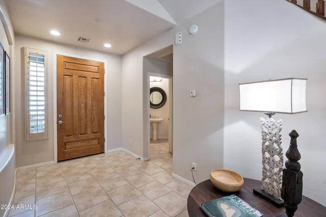 a view of an entryway with wooden floor