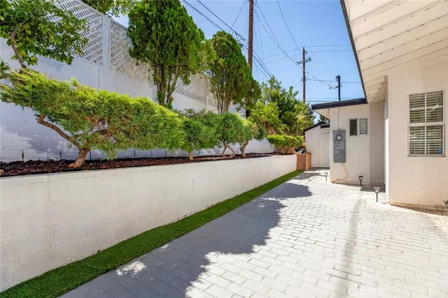 a view of a back yard and a house