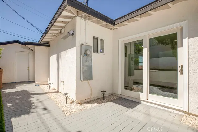 a bathroom with a tub and shower