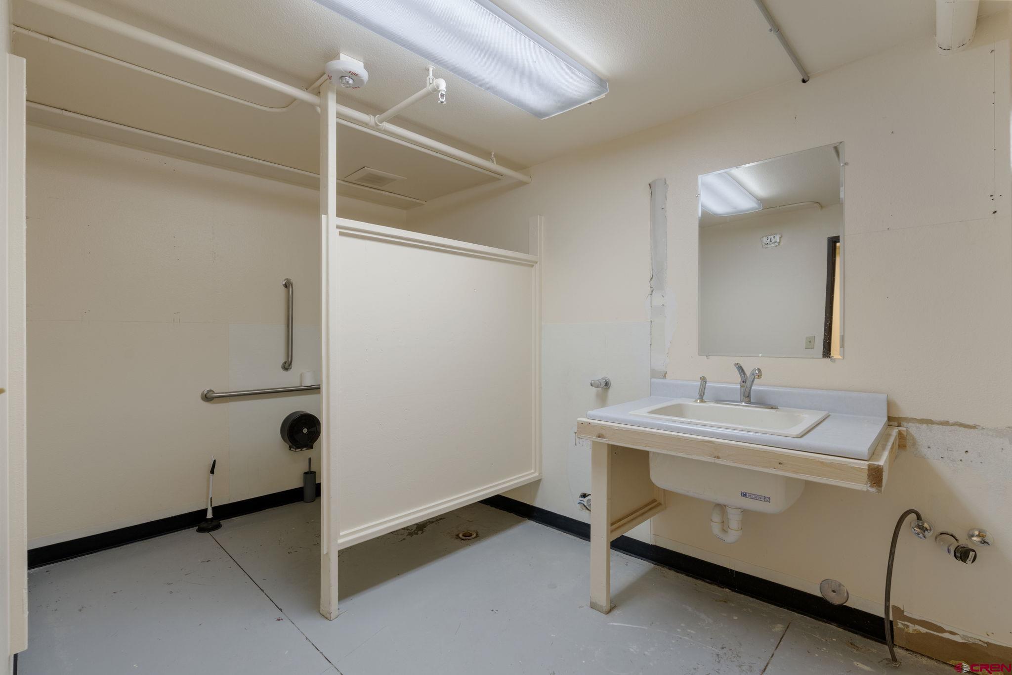 3206 Main Avenue, Unit 4 Durango, CO 81301 - Photo 14 of 18 a bathroom with a sink and a mirror