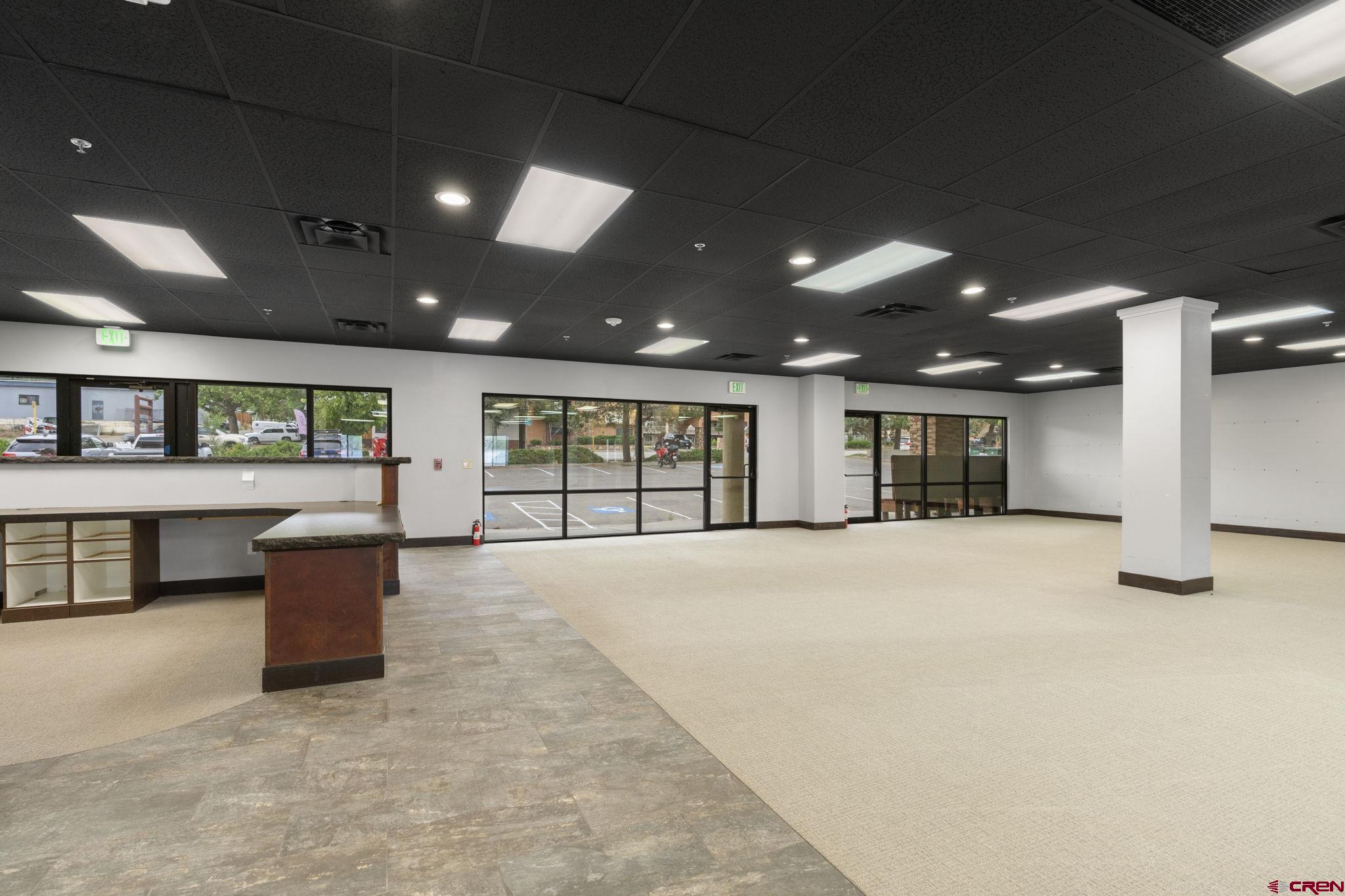 3206 Main Avenue, Unit 4 Durango, CO 81301 - Photo 8 of 18 a living room with furniture and a flat screen tv