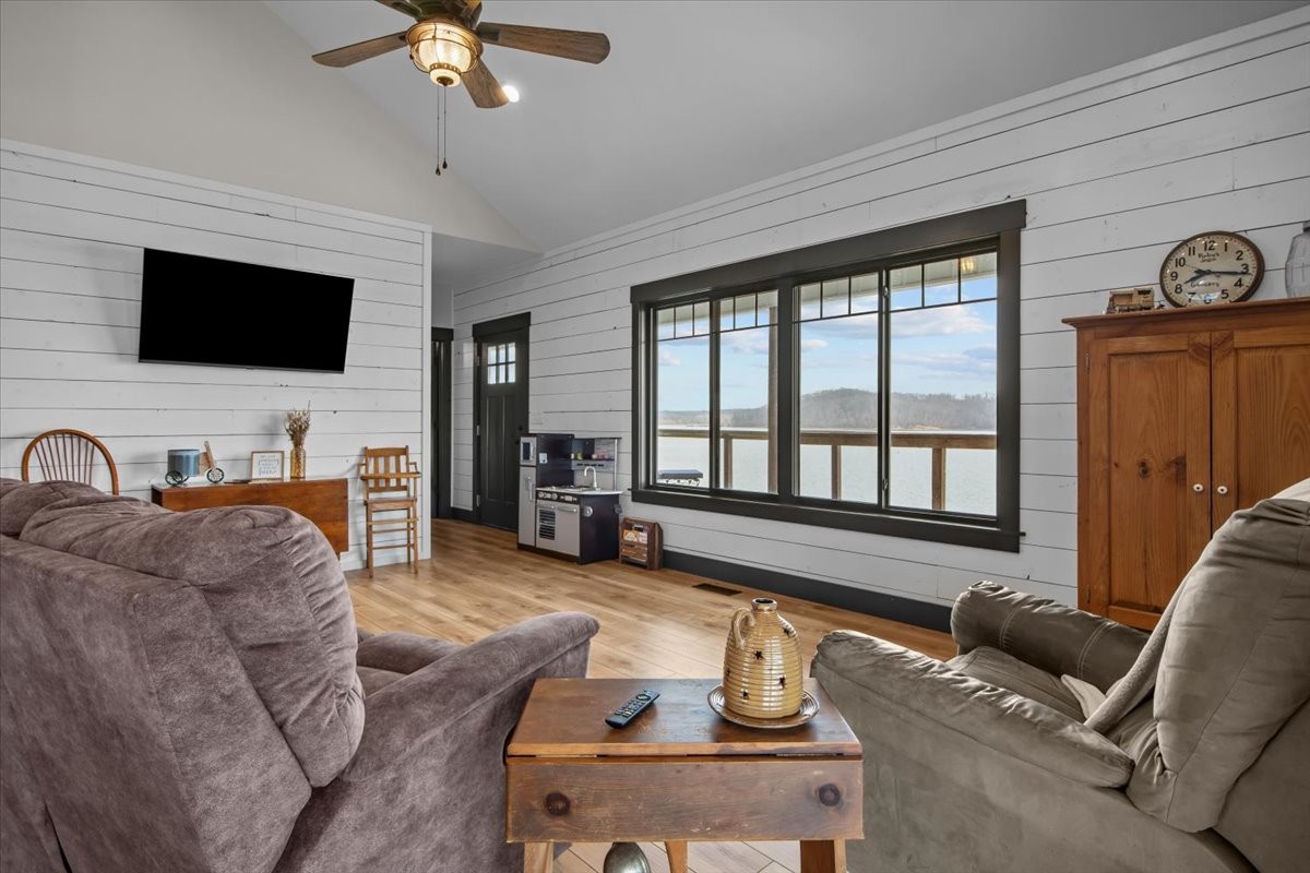 269 Paradise Lane Stewart, TN 37175 - Photo 11 of 31 a living room with furniture and a flat screen tv