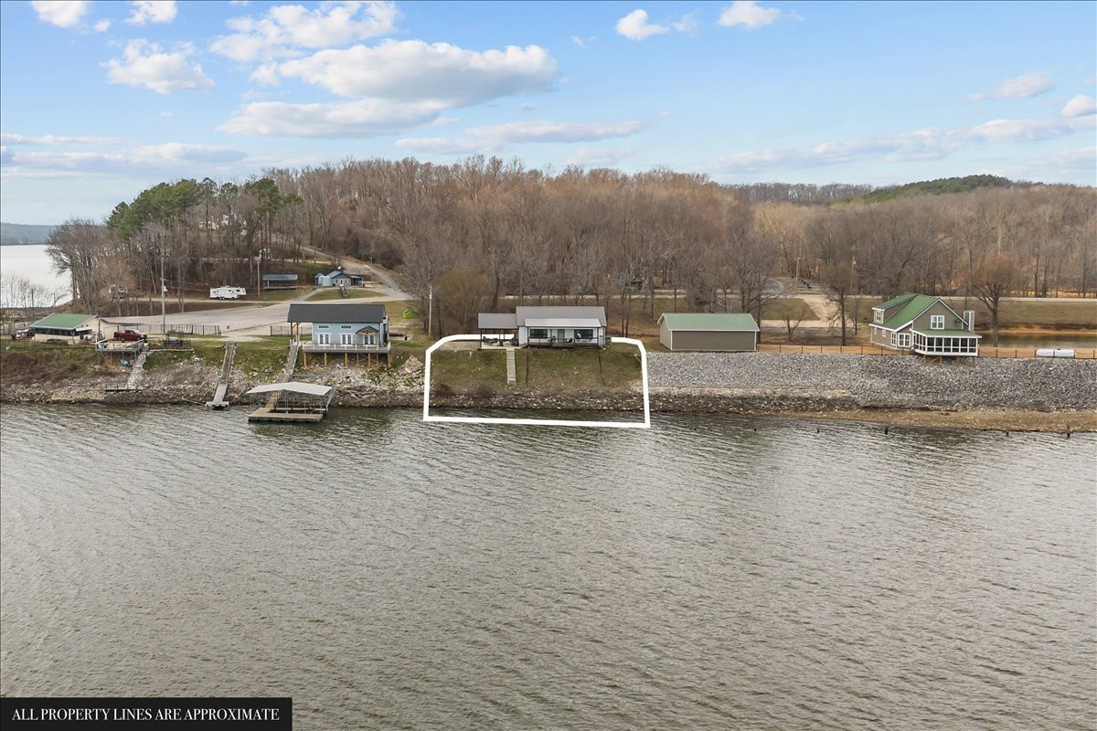 269 Paradise Lane Stewart, TN 37175 - Photo 2 of 31 a view of a lake with a mountain