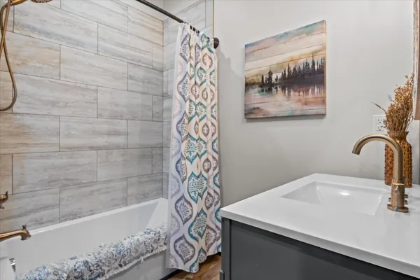 a bathroom with a sink and a bathtub