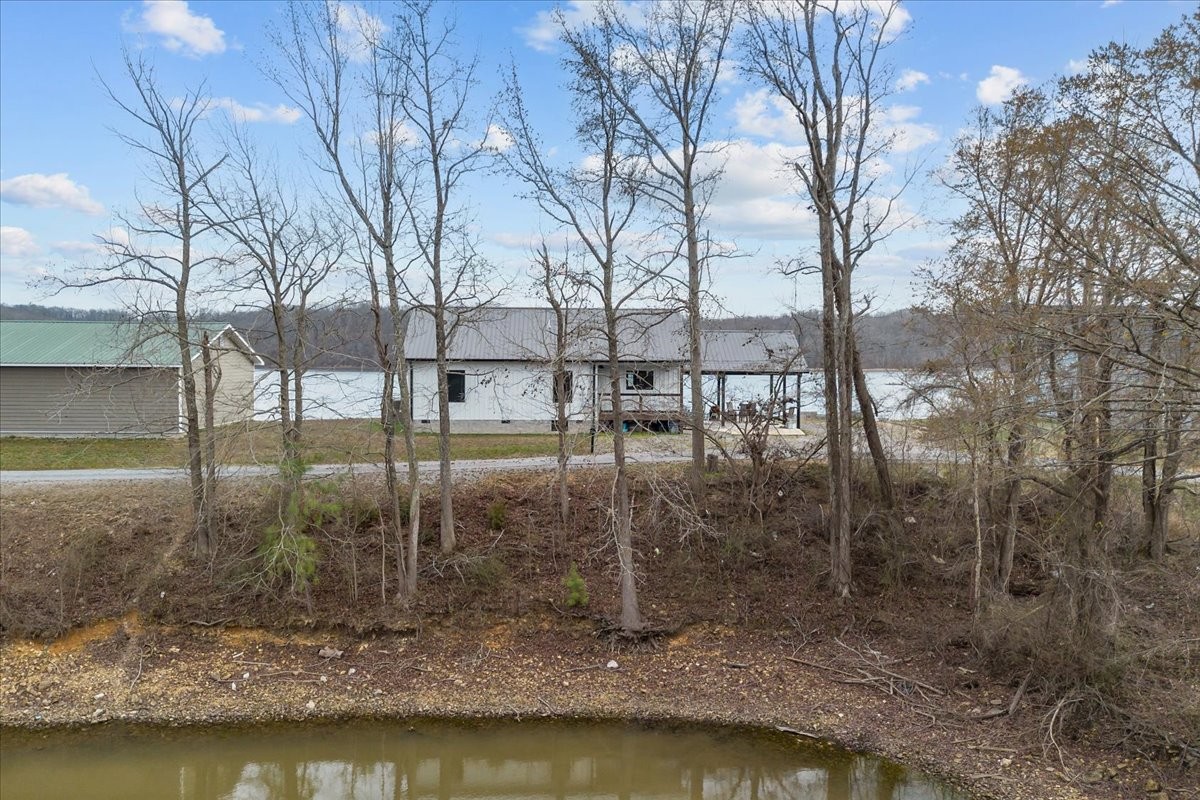 269 Paradise Lane Stewart, TN 37175 - Photo 27 of 31 a view of swimming pool with a yard
