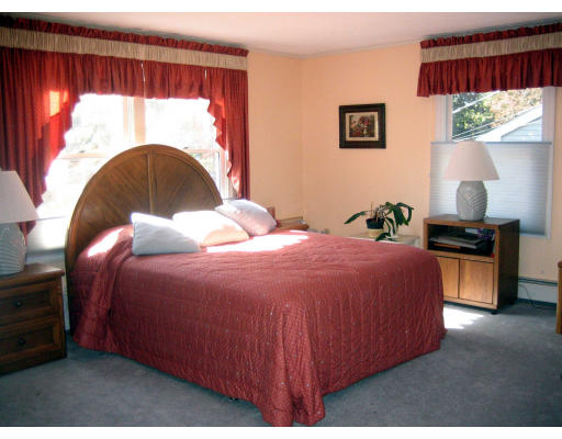 55 Staniford Street Newton, MA 02466 - Photo 11 of 17 a bedroom with a bed and a window