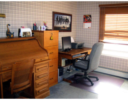 55 Staniford Street Newton, MA 02466 - Photo 12 of 17 a view of a workspace with furniture and a window