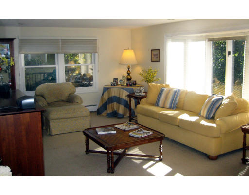 55 Staniford Street Newton, MA 02466 - Photo 2 of 17 a living room with furniture and a window