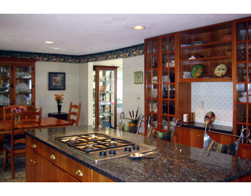 55 Staniford Street Newton, MA 02466 - Photo 6 of 17 a kitchen with stove and cabinets