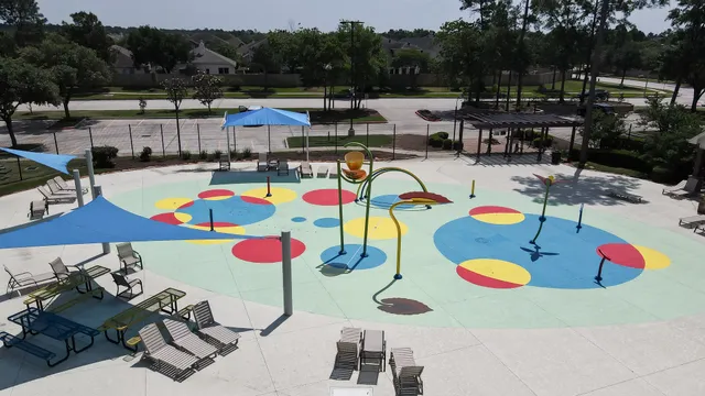 a view of swimming pool with outdoor seating
