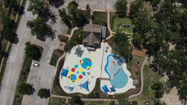 an aerial view of a swimming pool