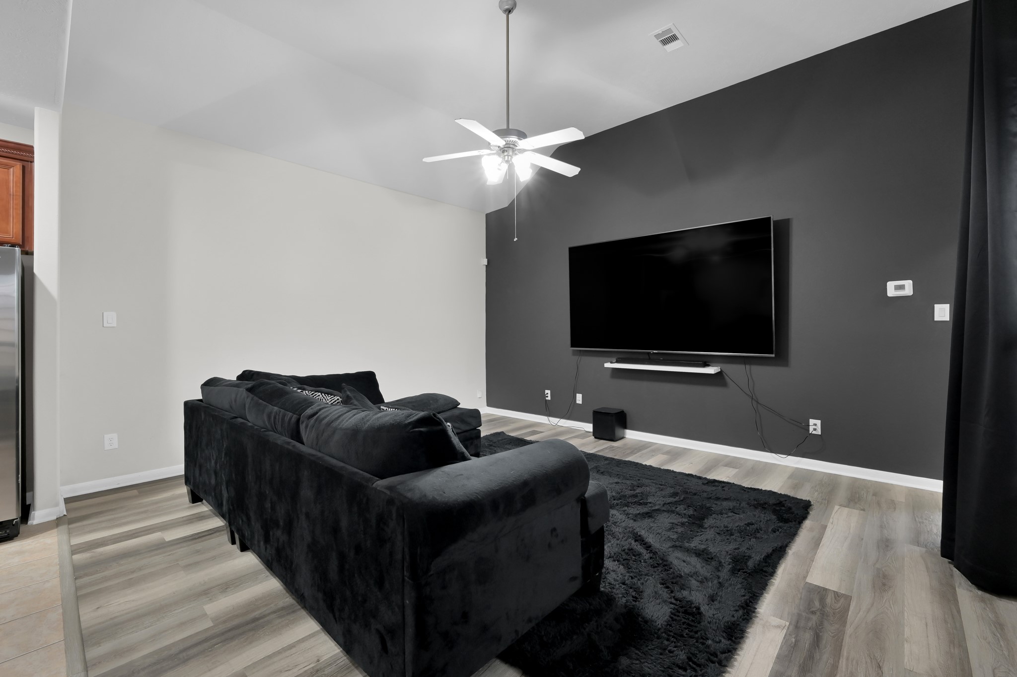3607 Cedar Flats Lane Spring, TX 77386 - Photo 4 of 41 a living room with furniture and a flat screen tv