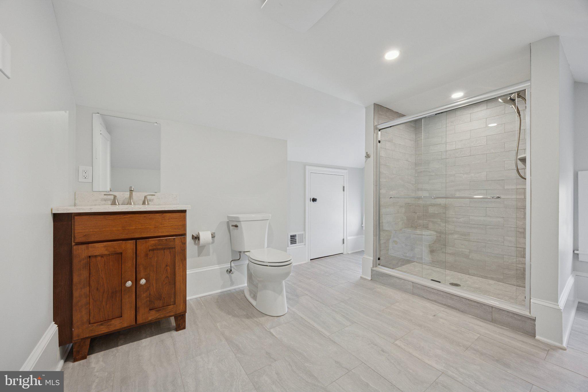 21 South Clinton Street, Unit 2 Doylestown, PA 18901 - Photo 3 of 13 Modern bathroom with sleek finishes.