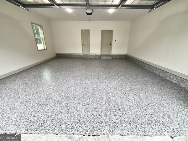 en empty room with windows