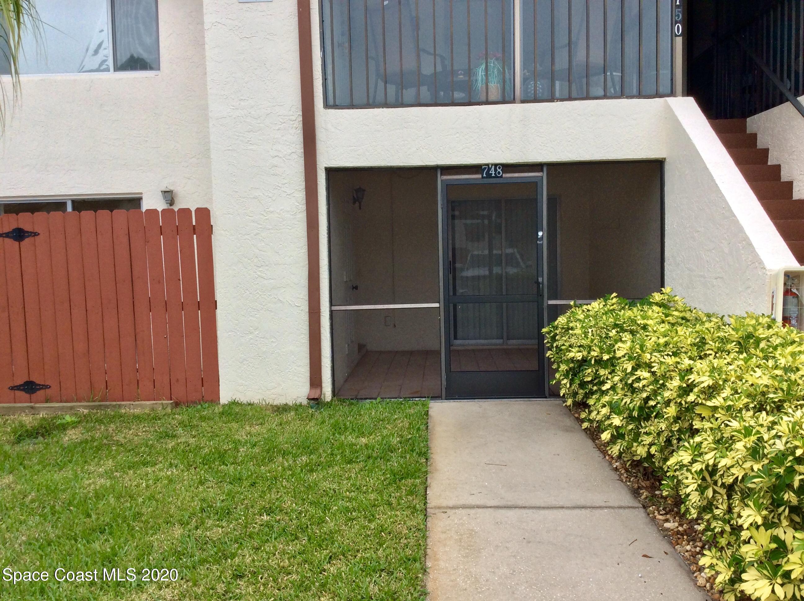 748 Ridge Club Drive Melbourne, FL 32934 - Photo 1 of 22 front
