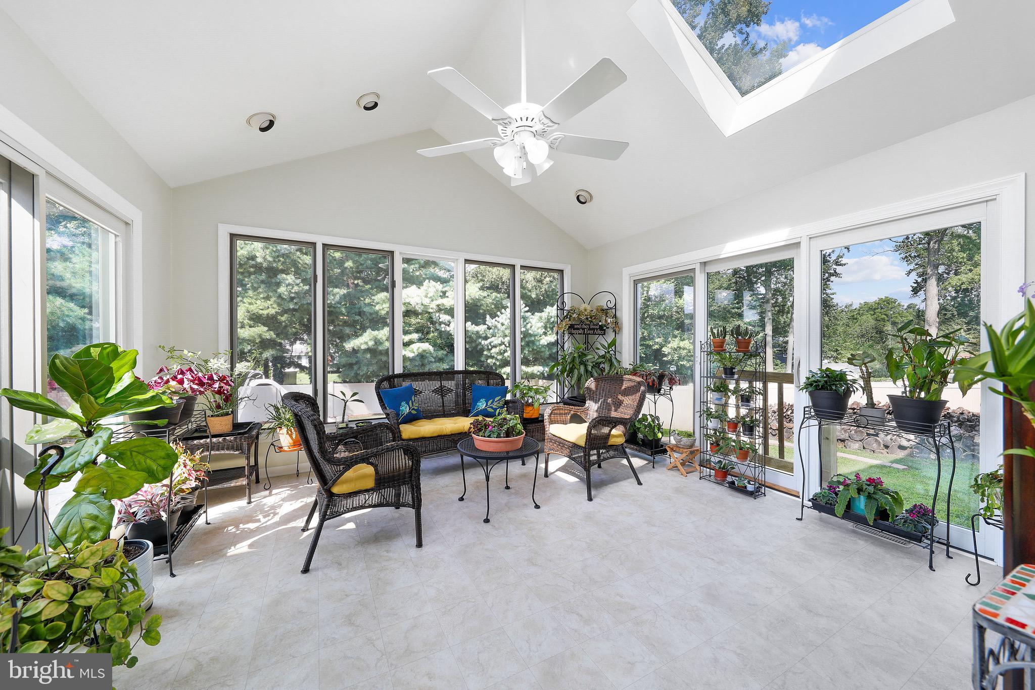 716 Liberty Road Mount Laurel, NJ 08054 - Photo 14 of 51 a living room filled with furniture and a potted plant
