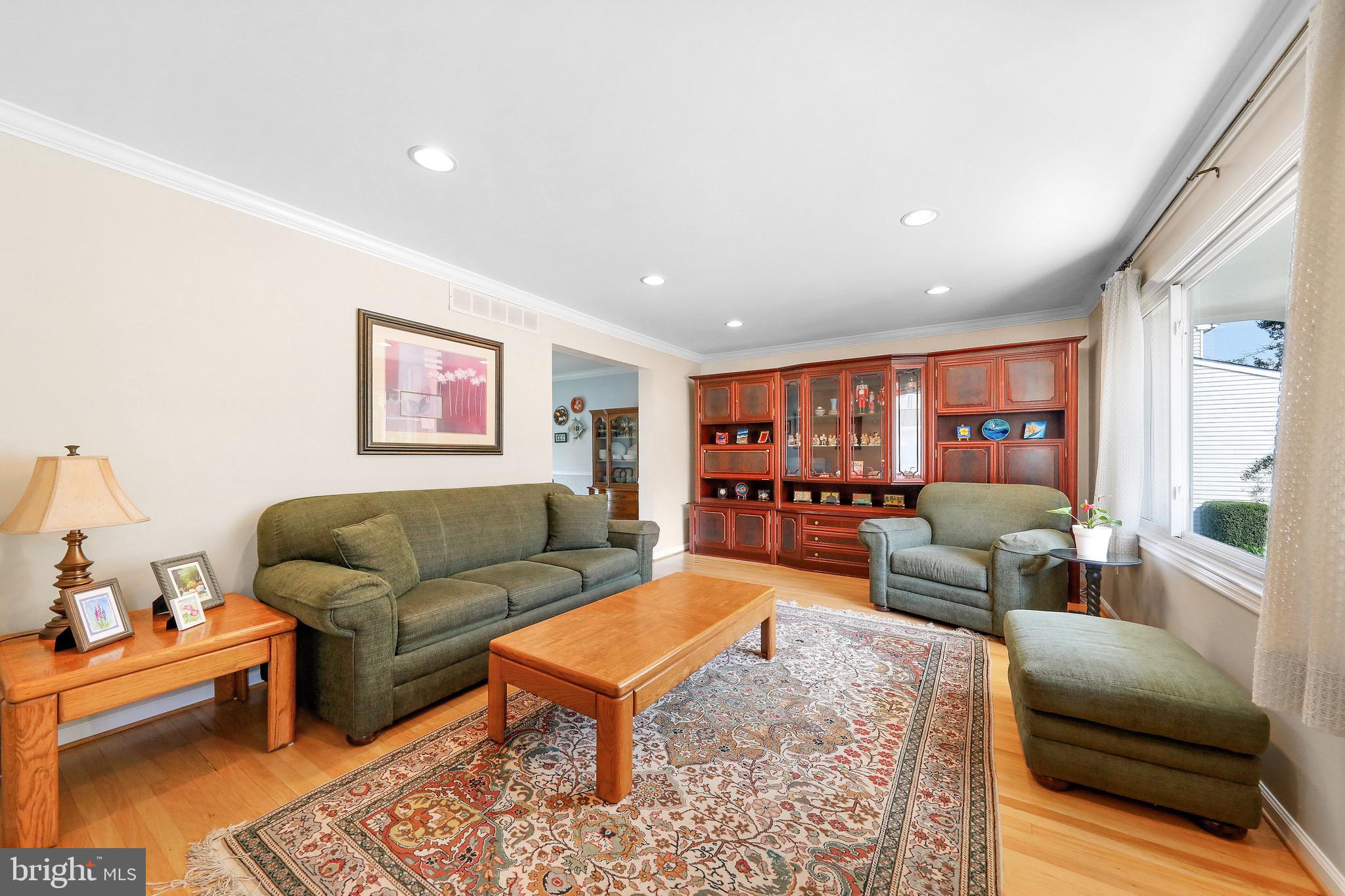 716 Liberty Road Mount Laurel, NJ 08054 - Photo 2 of 51 a living room with furniture and a wooden floor
