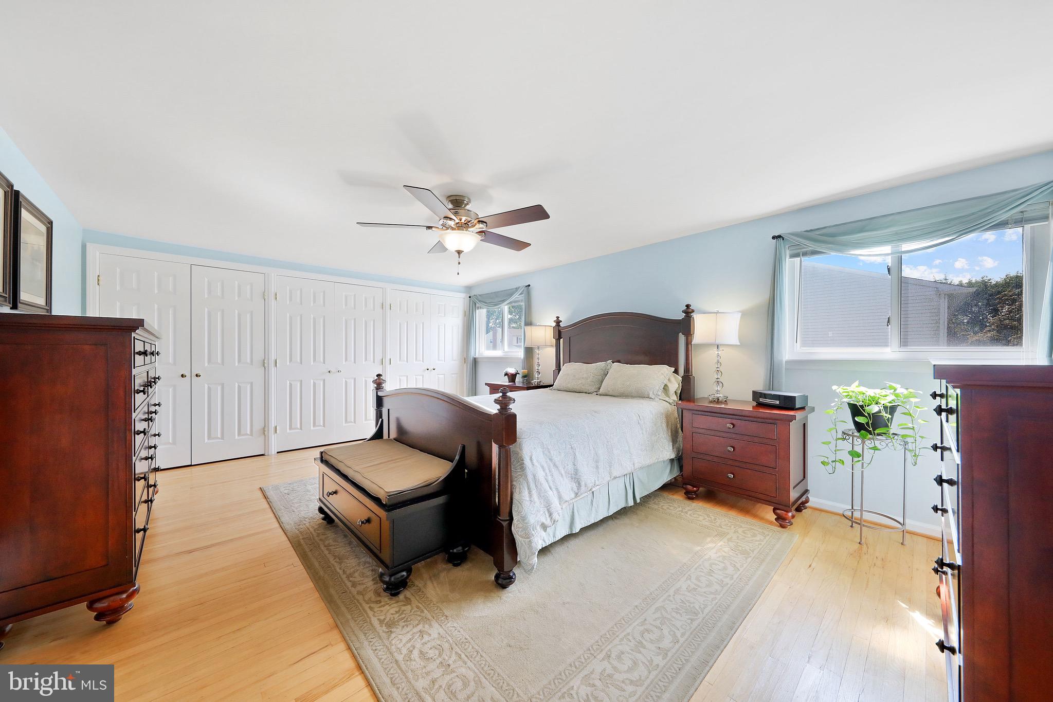 716 Liberty Road Mount Laurel, NJ 08054 - Photo 21 of 51 a bedroom with a bed couches and a flat tv screen