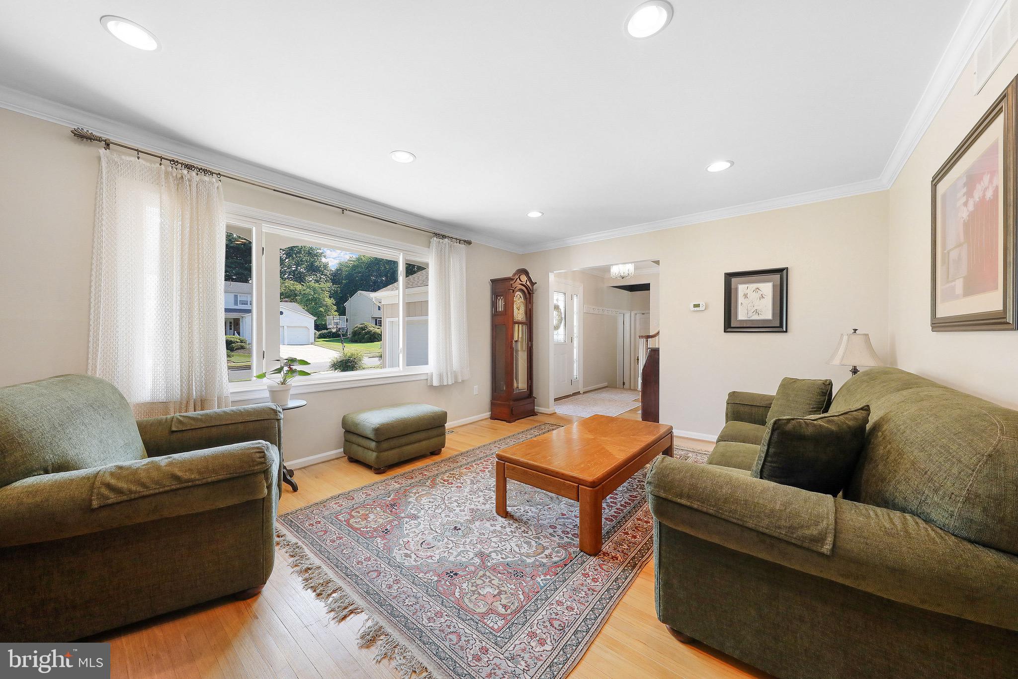 716 Liberty Road Mount Laurel, NJ 08054 - Photo 3 of 51 a living room with furniture and a large window