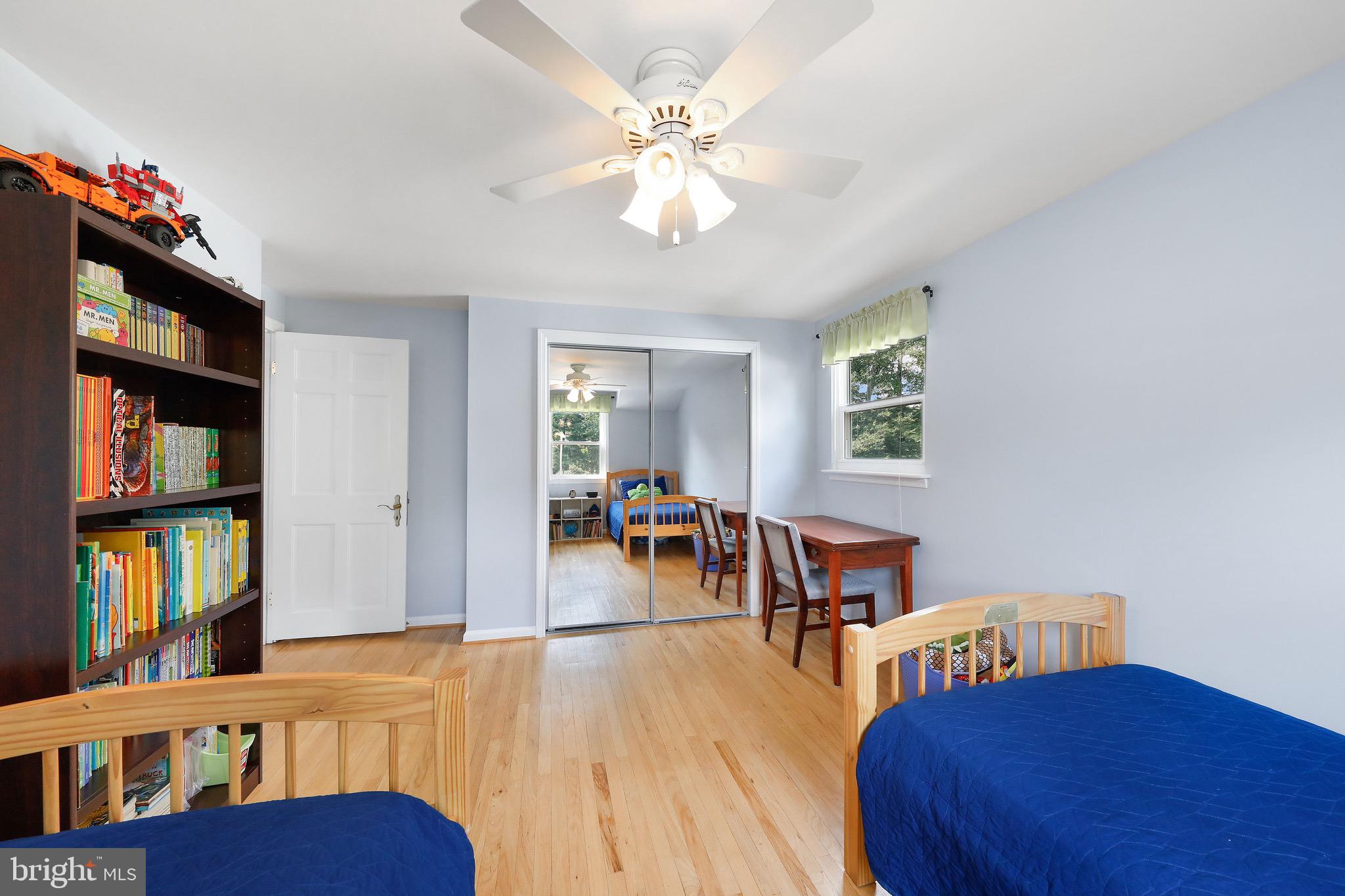 716 Liberty Road Mount Laurel, NJ 08054 - Photo 31 of 51 a living room with furniture and a book shelf