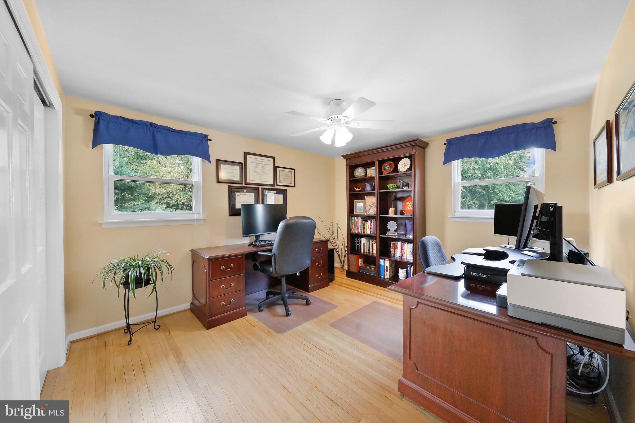 716 Liberty Road Mount Laurel, NJ 08054 - Photo 34 of 51 a work room with furniture and a bookshelf