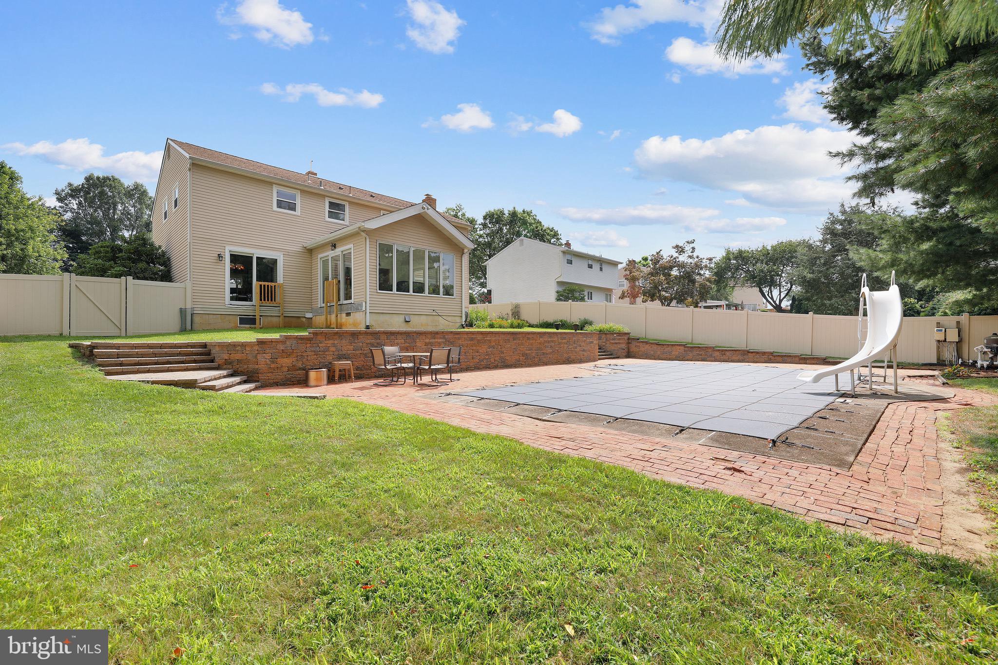 716 Liberty Road Mount Laurel, NJ 08054 - Photo 39 of 51 a backyard of a house with table and chairs